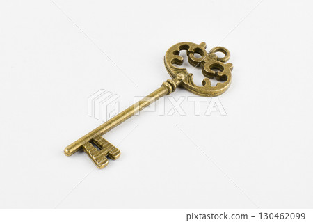 old vintage key isolated on a white background 130462099