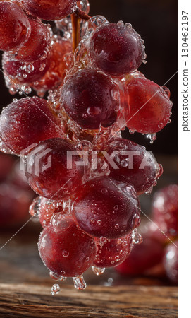 Grapes coated in a sparkling syrup drizzle create a refreshing delight 130462197