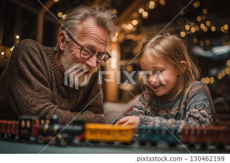 Joyful evening creativity between grandfather and daughter Joyful evening creativity between grandfather and daughter 130462199