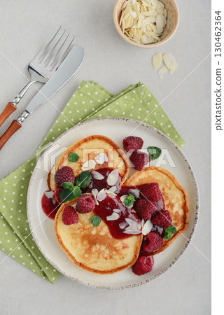 Homemade pancakes with yoghurt and fresh raspberry Homemade pancakes with yoghurt and fresh raspberry 130462364