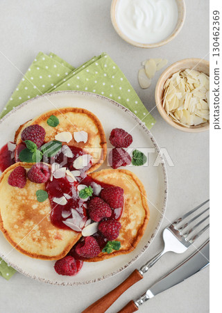 Homemade pancakes with yoghurt and fresh raspberry 130462369