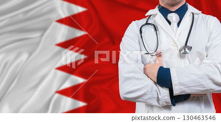 Male doctor with stethoscope on Bahrain flag. Doctor holding stethoscope on Bahrain flag 130463546