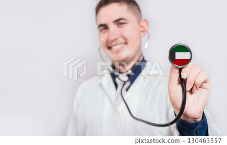Doctor showing stethoscope with Kuwait flag. Kuwait national healthcare concept 130463557