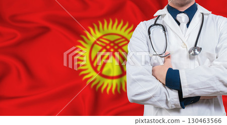 Male doctor with stethoscope on Kyrgyzstan flag. Doctor holding stethoscope on Kyrgyzstan flag 130463566