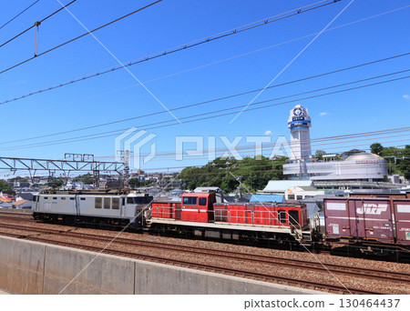 EF510+DD200 passing near Akashi Station 130464437