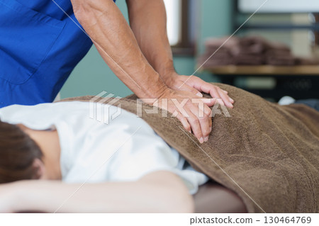 Osteopathic doctor and patient Osteopathic doctor and patient 130464769