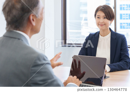 Businessmen's boss and subordinates having a meeting Businessmen's boss and subordinates having a meeting 130464778
