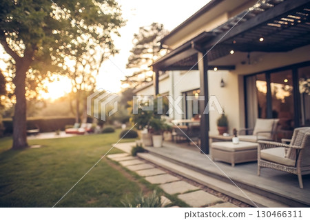 Cozy Modern Home with Scenic Garden and Soft Sunset Lighting in the Background 130466311