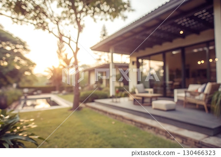Cozy Outdoor Living Space with Modern Furniture at Sunset in a Beautiful Garden Setting Cozy Outdoor Living Space with Modern Furniture at Sunset in a Beautiful Garden Setting 130466323