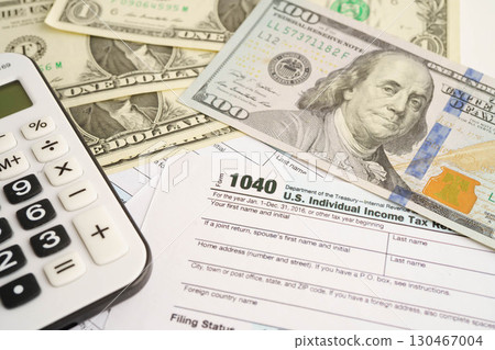 Tax form 1040 U.S. Individual Income Tax Return, business finance concept. 130467004