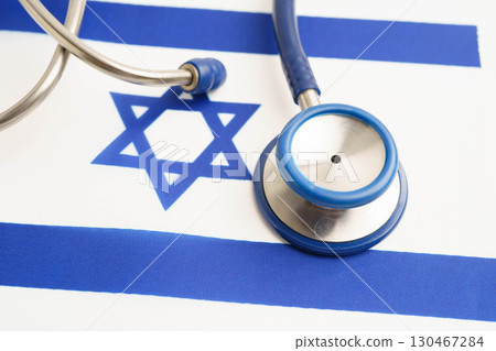 Israel flag with black stethoscope, Business and finance concept. Israel flag with black stethoscope, Business and finance concept. 130467284