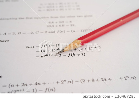 Pencil on mathematic formula exercise test paper in education school. Pencil on mathematic formula exercise test paper in education school. 130467285