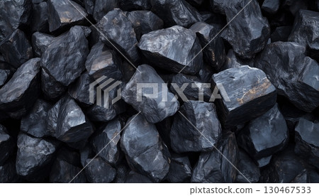 Black pile coal rock closeup pattern carbon energy dark background 130467533
