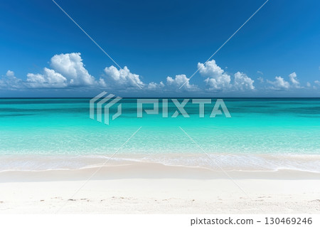 Incredible turquoise ocean meets pristine white sand on a sunny day at the beach Incredible turquoise ocean meets pristine white sand on a sunny day at the beach 130469246