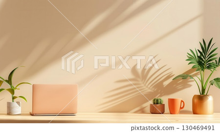 Minimalist workspace with laptop, plants, and sunlight. Minimalist workspace with laptop, plants, and sunlight. 130469491