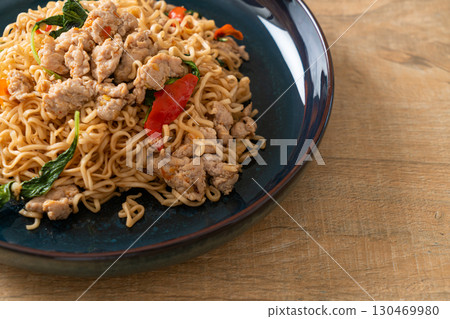 stir-fried instant noodles with basil and minced pork 130469980