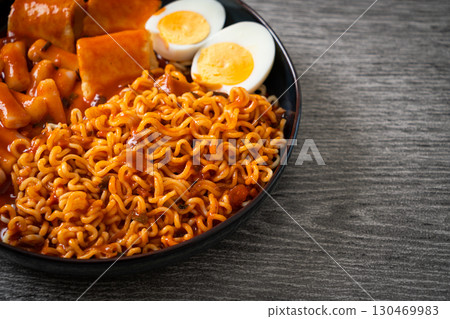 Korean instant noodles with Korean rice cake and fish cake and boiled egg Korean instant noodles with Korean rice cake and fish cake and boiled egg 130469983
