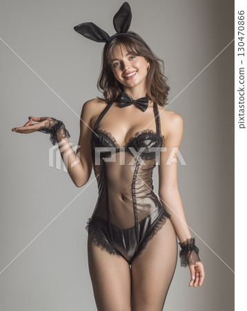 Portrait of a woman in a black bunny girl costume 130470866