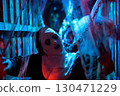 Spooky devilish nun in cage with hang death bride. 2025 Halloween 130471229