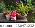Fresh watermelon juice smoothie on wooden table of outdoor cafe 130471232