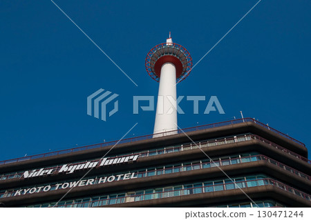 Nidec Kyoto tower hotel against blue sky, Kansai, Japan. Nidec Kyoto tower hotel against blue sky, Kansai, Japan. 130471244