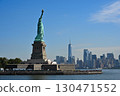 The Statue of Liberty and New York in clear skies 130471552