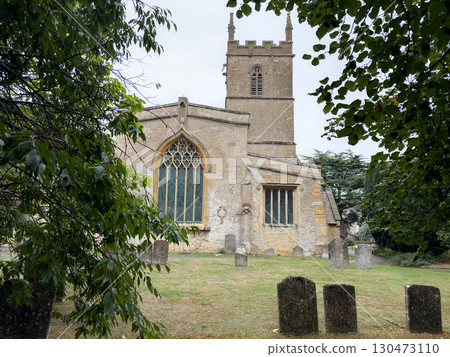 Historic Stone Church with Ancient Graveyard View Historic Stone Church with Ancient Graveyard View 130473110
