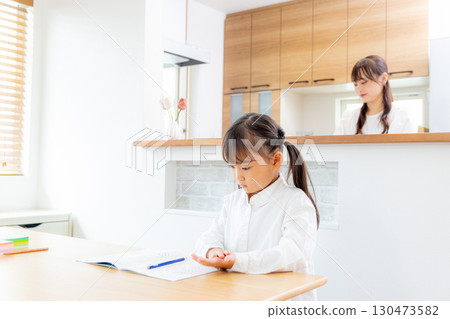 Elementary school girl studying Elementary school girl studying 130473582