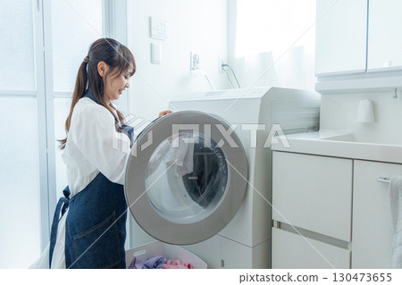 Housewives doing laundry 130473655