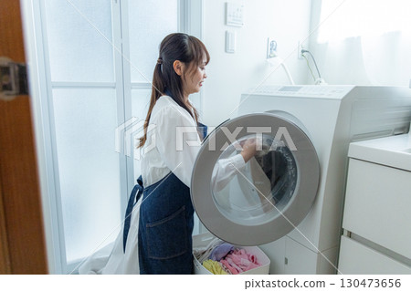 Housewives doing laundry 130473656