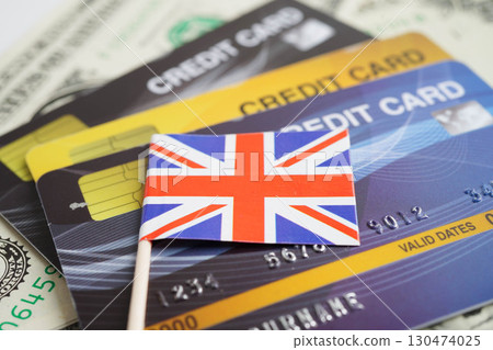 England flag on credit card, finance economy trading shopping online business. England flag on credit card, finance economy trading shopping online business. 130474025