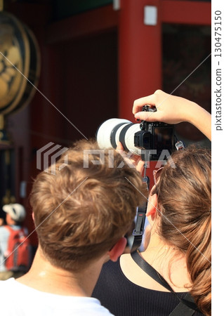 Tourists taking photos of Asakusa Foreign visitors to Japan sightseeing in Asakusa Tourists taking photos of Asakusa Foreign visitors to Japan sightseeing in Asakusa 130475150