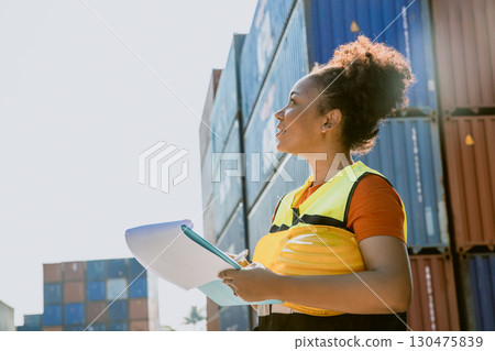 Women work container port, Customs at container yard manage,Cargo Import Export. Logistics industry. 130475839