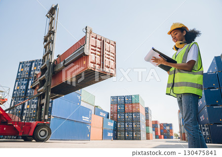 Women work container port, Customs at container yard manage,Cargo Import Export. Logistics industry. Women work container port, Customs at container yard manage,Cargo Import Export. Logistics industry. 130475841