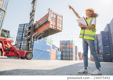 Women work container port, Customs at container yard manage,Cargo Import Export. Logistics industry. 130475842