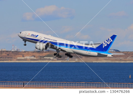 ANA plane takes off and ascends from Haneda Airport ANA plane takes off and ascends from Haneda Airport 130476266