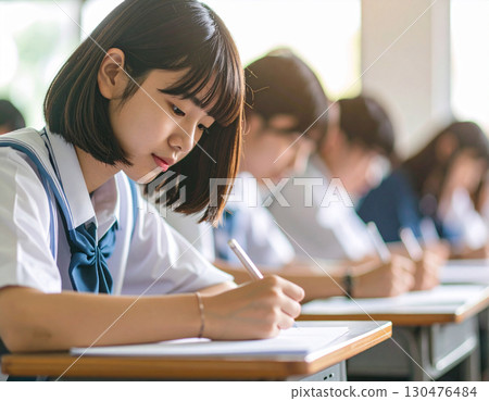 High school girls attending classes 130476484