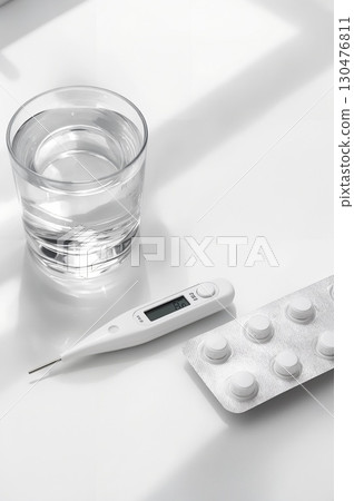 Clean desk with thermometer and medicine (medical and healthcare background) 2:3 Clean desk with thermometer and medicine (medical and healthcare background) 2:3 130476811