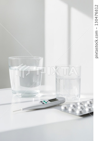 Clean desk with thermometer and medicine (medical and healthcare background) 2:3 Clean desk with thermometer and medicine (medical and healthcare background) 2:3 130476812