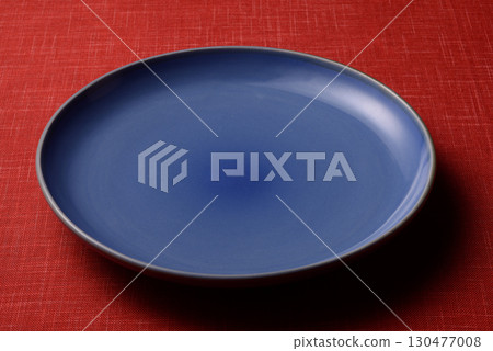 Blue plate background material 130477008