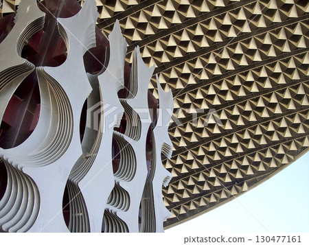 Unique architectural structure showcasing intricate geometric patterns at a modern design exhibition 130477161