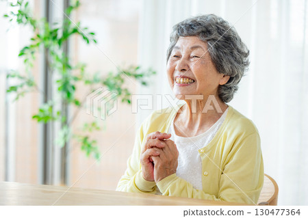 Senior woman listening to explanation 130477364