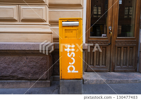 Finnish postal mailbox in Helsinki, Finland Finnish postal mailbox in Helsinki, Finland 130477483