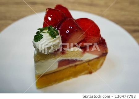 A delicious tart filled with fresh strawberries A delicious tart filled with fresh strawberries 130477798