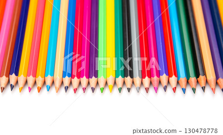 Colorful collection of sharpened pencils arranged neatly on white surface Colorful collection of sharpened pencils arranged neatly on white surface 130478778