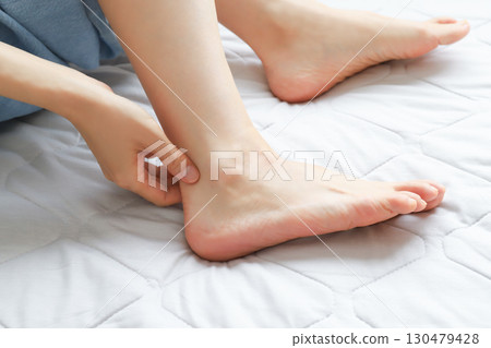 Female ankle 130479428