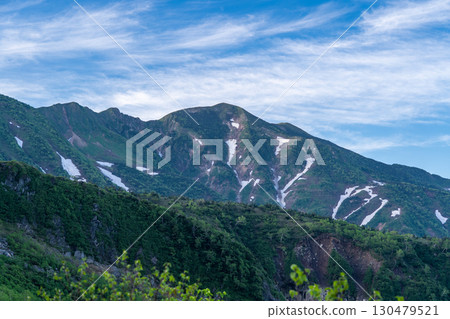 View of Mt. Betsuyama and Obyobu from the Sabo Shindo Trail. Climbing Mt. Hakusan Gozenmine in early summer (Kuroboko Rock Course) View of Mt. Betsuyama and Obyobu from the Sabo Shindo Trail. Climbing Mt. Hakusan Gozenmine in early summer (Kuroboko Rock Course) 130479521