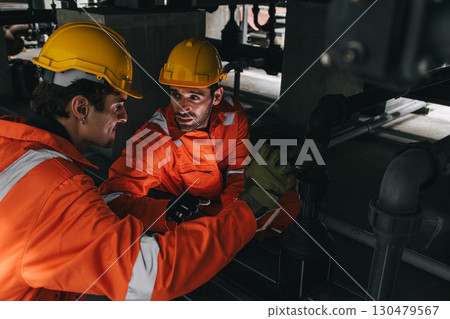 Two professional engineer male teamwork service maintenance, Worker industry water pipe tube system 130479567