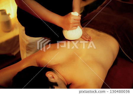 Hot herbal ball spa massage body treatment. Quiescent 130480036