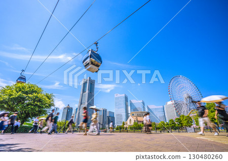 Yokohama cityscape in Japan...View of the ropeway and Yokohama Landmark Tower from Canal Park Station and Canal Park Yokohama cityscape in Japan...View of the ropeway and Yokohama Landmark Tower from Canal Park Station and Canal Park 130480260